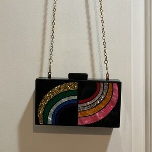 Circus by Sam Edelman black acrylic art deco rainbow design magnet close clutch